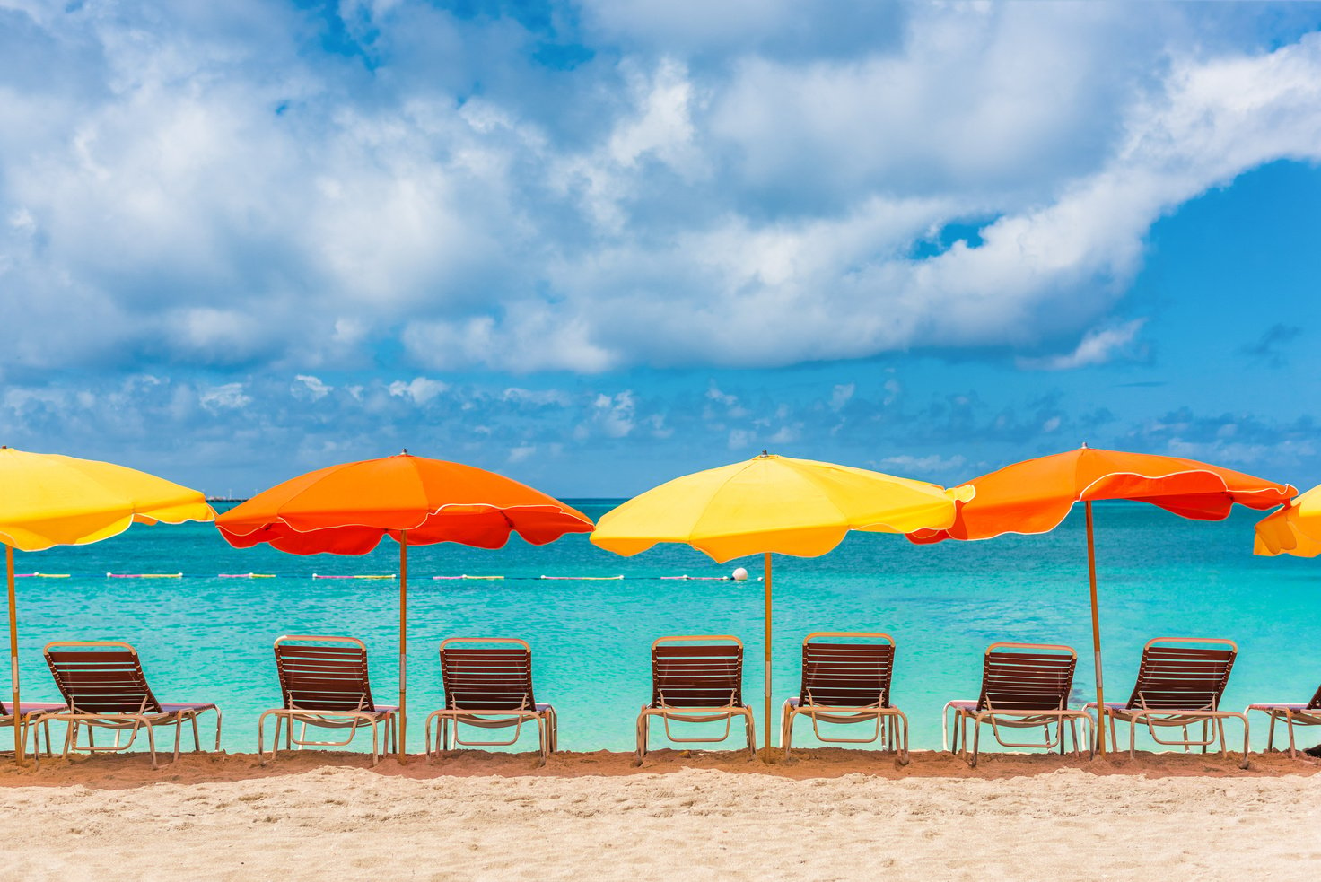 Beach Chairs and Umbrellas Vacation Background